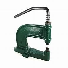 Snap fastening machine